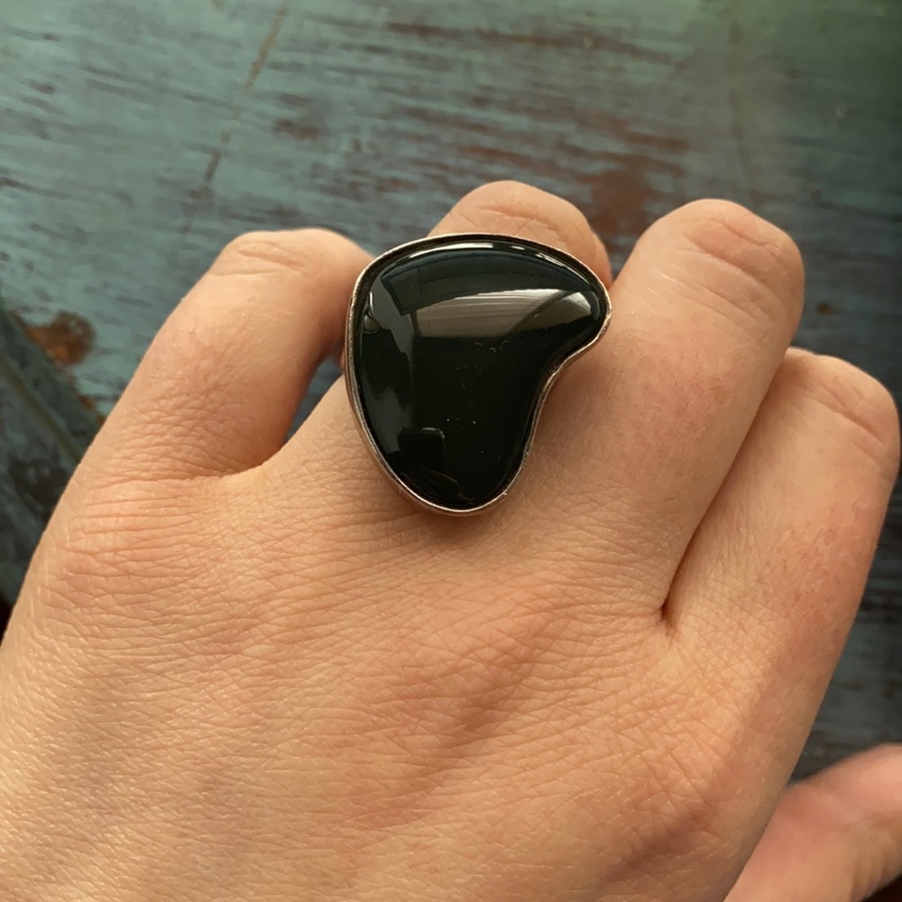 Silver ring with green stone